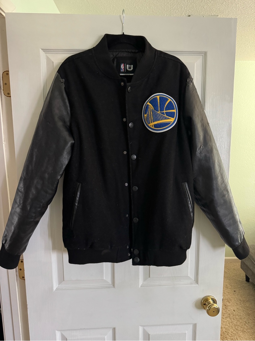 NBA Black Jacket with Red, White & Blue NBA Logo Patch